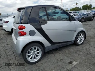 2009 Smart fortwo Pure with VIN WMEEJ31X89K251402, listed as a Copart auction lot 56791545 with 52,636 mi miles and Clean title. Bid and sale history available at DreamBid. Image 3.