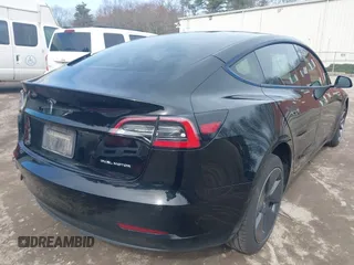 2022 Tesla Model 3 Long Range with VIN 5YJ3E1EBXNF177128, listed as a IAAI auction lot 41966089 with 75,140 mi miles and . Bid and sale history available at DreamBid. Image 4.