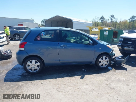 2010 Toyota Yaris with VIN JTDJT4K36A5285298, listed as a IAAI auction lot 42003609 with 158,418 mi miles. Bid and sale history available at carsss.com. Image 13.