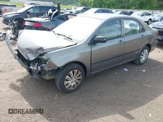 2003 Toyota Corolla CE with VIN 1NXBR32E43Z188152, listed as a IAAI auction lot 42115553 with 156,064 mi miles and . Bid and sale history available at DreamBid. Image 2.