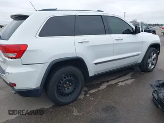 2013 Jeep Grand Cherokee Overland with VIN 1C4RJECG3DC620873, listed as a IAAI auction lot 40909601 with 195,374 mi miles. Bid and sale history available at carsss.com. Image 4.