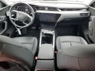 2021 Audi e-tron Premium Plus with VIN WA1LAAGE4MB003487, listed as a Copart auction lot 82790024 with 28,165 mi miles and Salvage title. Bid and sale history available at DreamBid. Image 8.