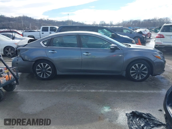 2016 Nissan Altima S z VIN 1N4AL3AP5GC221181, wystawiony jako IAAI lot #41341404 z przebiegiem 177 674 mil mil oraz . Historia ofert i sprzedaży dostępna na DreamBid. Obrazek 13.