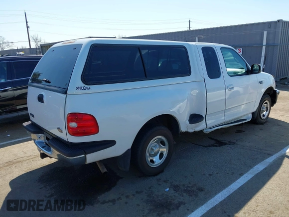 1998 Ford F-150 XL with VIN 1FTZX072XWKA12003, listed as a IAAI auction lot 41765328 with 119,445 mi miles and . Bid and sale history available at DreamBid. Image 4.