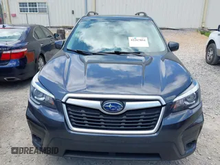 2019 Subaru Forester Premium with VIN JF2SKAEC3KH544056, listed as a IAAI auction lot 42267894 with 104,809 mi miles and . Bid and sale history available at DreamBid. Image 6.