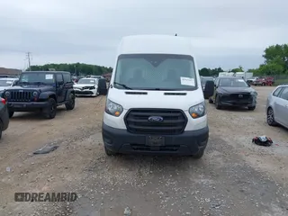 2020 Ford Transit Cargo with VIN 1FTBR3X83LKB51984, listed as a IAAI auction lot 42567147 with 209,178 mi miles and . Bid and sale history available at DreamBid. Image 12.
