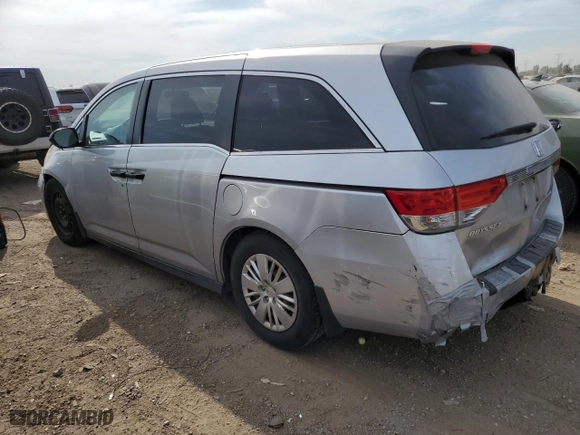 2014 Honda Odyssey LX with VIN 5FNRL5H2XEB135917, listed as a Copart auction lot 79043514 with 329,233 mi miles and Salvage Title. Bid and sale history available at carsss.com. Image 2.