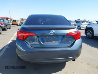 2019 Toyota Corolla L with VIN 2T1BURHE3KC207010, listed as a IAAI auction lot 42004596 with 106,188 mi miles and . Bid and sale history available at DreamBid. Image 16.