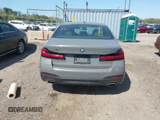 2021 BMW 5 Series 540i xDrive with VIN WBA73BJ03MWX30307, listed as a IAAI auction lot 41891615 with 27,374 mi miles and . Bid and sale history available at DreamBid. Image 16.