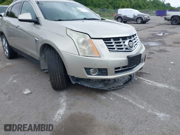 2014 Cadillac SRX Performance Collection z VIN 3GYFNCE35ES610504, wystawiony jako IAAI lot #42133548 z przebiegiem 140 306 mil mil oraz . Historia ofert i sprzedaży dostępna na DreamBid. Obrazek 6.
