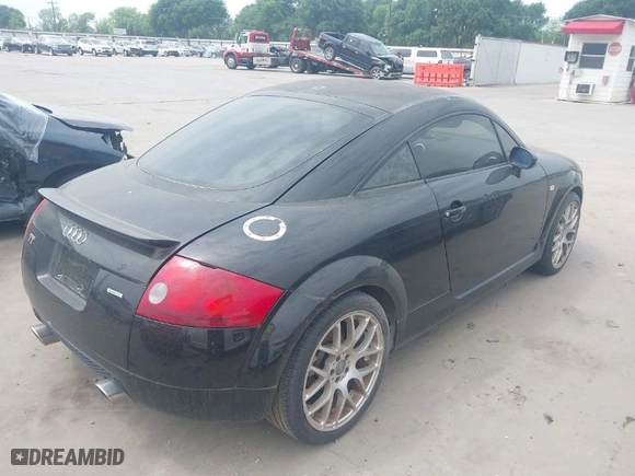 2001 Audi TT with VIN TRUWT28N311010570, listed as a IAAI auction lot 41969135 with 146,851 mi miles. Bid and sale history available at carsss.com. Image 4.
