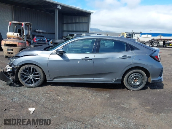 2021 Honda Civic Sport with VIN SHHFK7H40MU222581, listed as a IAAI auction lot 41451121 with 28,372 mi miles and . Bid and sale history available at DreamBid. Image 14.
