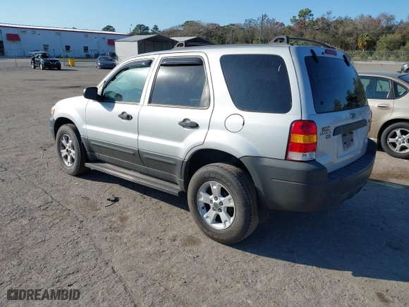 2006 Ford Escape XLT with VIN 1FMCU03166KB47650, listed as a IAAI auction lot 41529751 with 153,962 mi miles. Bid and sale history available at carsss.com. Image 3.