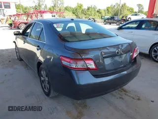 2011 Toyota Camry LE with VIN 4T4BF3EK2BR211894, listed as a IAAI auction lot 41783070 with 141,724 mi miles and . Bid and sale history available at carsss.com. Image 3.
