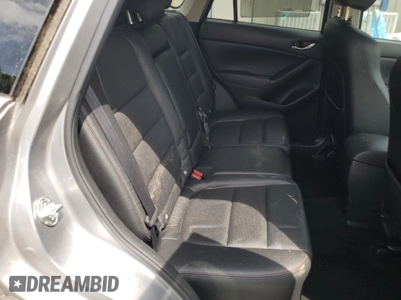 2014 Mazda CX-5 Grand Touring with VIN JM3KE4DY9E0416967, listed as a Copart auction lot 54215285 with 77,296 mi miles and Salvage Title. Bid and sale history available at DreamBid. Image 10.