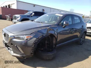 2017 Mazda CX-3 Touring with VIN JM1DKFC79H0163216, listed as a Copart auction lot 47012165 with 102,889 mi miles and Salvage Title. Bid and sale history available at carsss.com. Image 1.