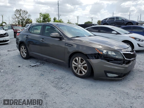 2013 Kia Optima EX z VIN 5XXGN4A72DG188821, wystawiony jako Copart lot #65546495 z przebiegiem 187 286 mil mil oraz Szkoda całkowita • Salvage title. Historia ofert i sprzedaży dostępna na DreamBid. Obrazek 4.