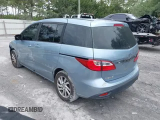 2012 Mazda 5 Sport with VIN JM1CW2BL4C0130446, listed as a IAAI auction lot 42215533 with 238,221 mi miles and . Bid and sale history available at DreamBid. Image 3.