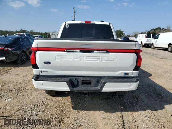 2022 Ford F-150 Lightning Pro z VIN 1FT6W1EV6NWG01209, wystawiony jako Copart lot #45301935 z przebiegiem 25 141 mil mil oraz Szkody całkowita. Historia ofert i sprzedaży dostępna na DreamBid. Obrazek 6.