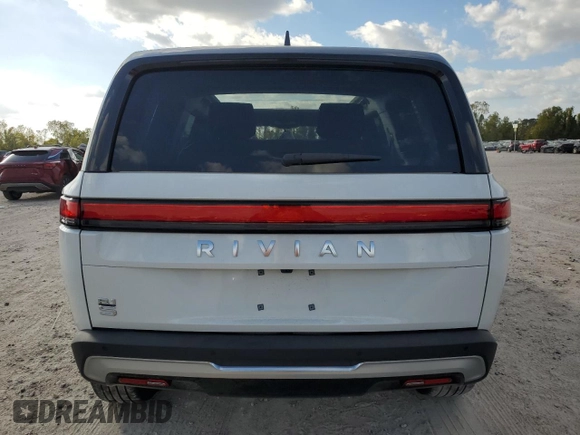 2023 Rivian R1S Adventure with VIN 7PDSGBBA3PN017791, listed as a Copart auction lot 82397374 with 20,733 mi miles and Salvage Title. Bid and sale history available at carsss.com. Image 6.