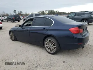 2012 BMW 3 Series 328i with VIN WBA3A5C57CF341019, listed as a Copart auction lot 88589685 with 107,295 mi miles and Salvage Title. Bid and sale history available at DreamBid. Image 2.