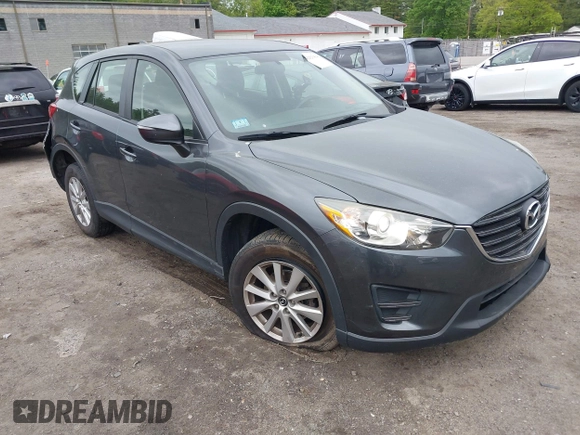2016 Mazda CX-5 Sport with VIN JM3KE4BY9G0710004, listed as a IAAI auction lot 42323434 with 83,320 mi miles and . Bid and sale history available at DreamBid. Image 1.