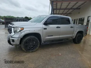 2018 Toyota Tundra SR5 z VIN 5TFDW5F13JX720544, wystawiony jako Copart lot #54373715 z przebiegiem 160 995 mil mil oraz Tytuł czysty. Historia ofert i sprzedaży dostępna na DreamBid. Obrazek 1.