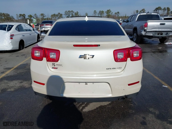2014 Chevrolet Malibu LTZ with VIN 1G11J5SXXEF114531, listed as a IAAI auction lot 41409618 with 153,040 mi miles. Bid and sale history available at carsss.com. Image 17.