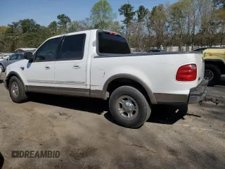 2002 Ford F-150 XLT with VIN 1FTRW07L32KE29159, listed as a Copart auction lot 50596125 with 198,058 mi miles and Salvage Title. Bid and sale history available at carsss.com. Image 2.