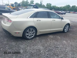2014 Lincoln MKZ Hybrid with VIN 3LN6L2LU8ER813195, listed as a IAAI auction lot 42578644 with 153,893 mi miles and . Bid and sale history available at DreamBid. Image 4.