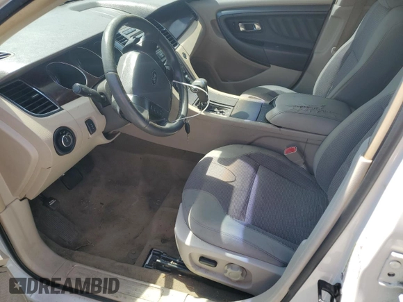 2011 Ford Taurus SEL with VIN 1FAHP2EW0BG160421, listed as a Copart auction lot 56014075 with 212,421 mi miles and Clean Title. Bid and sale history available at DreamBid. Image 7.