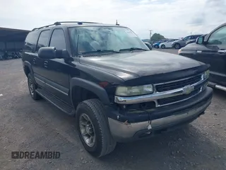 2004 Chevrolet Suburban LT z VIN 3GNGK26G14G143797, wystawiony jako IAAI lot #42393827 z przebiegiem 209 067 mil mil oraz . Historia ofert i sprzedaży dostępna na DreamBid. Obrazek 1.