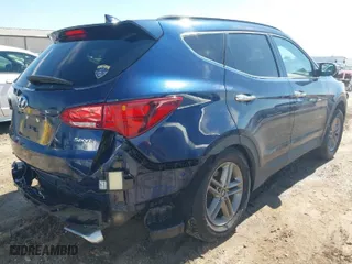 2018 Hyundai Santa Fe Sport 2.4L with VIN 5XYZU3LB0JG552328, listed as a IAAI auction lot 41869758 with 88,710 mi miles. Bid and sale history available at carsss.com. Image 4.