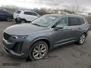 2020 Cadillac XT6 FWD Premium Luxury with VIN 1GYKPCRS5LZ201302, listed as a Copart auction lot 47898165 with 61,527 mi miles and Salvage Title. Bid and sale history available at carsss.com. Image 1.
