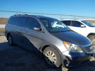 2010 Honda Odyssey EX-L with VIN 5FNRL3H76AB040457, listed as a IAAI auction lot 42214329 with 182,051 mi miles. Bid and sale history available at carsss.com. Image 1.