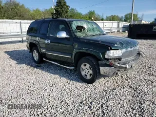 2004 Chevrolet Tahoe LS z VIN 1GNEC13Z24R174609, wystawiony jako Copart lot #52234105 z przebiegiem 182 306 mil mil oraz Szkoda całkowita • Salvage title. Historia ofert i sprzedaży dostępna na DreamBid. Obrazek 12.