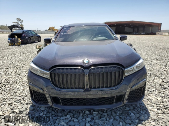 2020 BMW 7 Series 740i z VIN WBA7T2C02LGF96611, wystawiony jako Copart lot #61451935 z przebiegiem 61 185 mil mil oraz Szkoda całkowita • Salvage title. Historia ofert i sprzedaży dostępna na DreamBid. Obrazek 5.