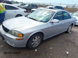 2002 Lincoln LS w/Base Pkg with VIN 1LNHM86S62Y672921, listed as a IAAI auction lot 42100871 with 207,170 mi miles. Bid and sale history available at carsss.com. Image 2.