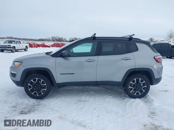 2020 Jeep Compass Trailhawk with VIN 3C4NJDDB1LT203329, listed as a IAAI auction lot 41301931 with 79,035 mi miles and . Bid and sale history available at carsss.com. Image 14.
