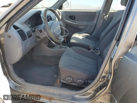 2005 Hyundai Accent GLS with VIN KMHCG45C05U605716, listed as a Copart auction lot 69445324 with 158,082 mi miles and Clean Title. Bid and sale history available at carsss.com. Image 7.
