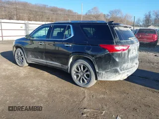 2018 Chevrolet Traverse Premier z VIN 1GNEVJKW5JJ174261, wystawiony jako IAAI lot #41656906 z przebiegiem 101 908 mil mil oraz . Historia ofert i sprzedaży dostępna na DreamBid. Obrazek 3.