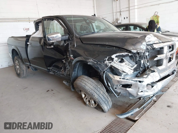 2017 Ram 2500 Laramie with VIN 3C6UR5FL8HG671078, listed as a IAAI auction lot 42233014 with 295,572 mi miles and . Bid and sale history available at DreamBid. Image 1.