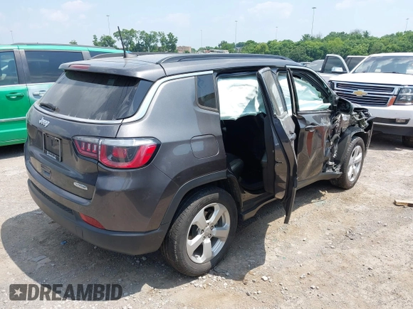 2019 Jeep Compass Latitude with VIN 3C4NJCBB1KT833007, listed as a IAAI auction lot 42401265 with 106,973 mi miles and . Bid and sale history available at DreamBid. Image 4.