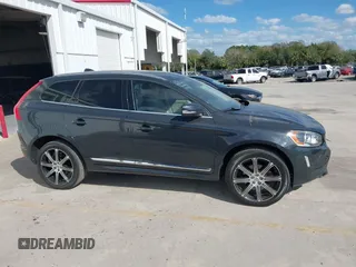 2015 Volvo XC60 T5 Drive-E Premier Plus with VIN YV440MDC7F2606774, listed as a IAAI auction lot 41564034 with 166,758 mi miles. Bid and sale history available at carsss.com. Image 13.