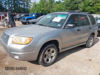 2007 Subaru Forester X with VIN JF1SG63687H716573, listed as a IAAI auction lot 42534135 with 235,827 mi miles and . Bid and sale history available at DreamBid. Image 2.