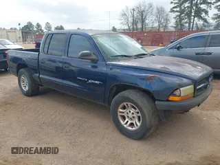 2001 Dodge Dakota z VIN 1B7HL2AX61S265190, wystawiony jako IAAI lot #41796670 z przebiegiem 244 645 mil mil oraz . Historia ofert i sprzedaży dostępna na DreamBid. Obrazek 1.