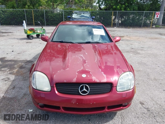 2000 Mercedes-Benz SLK 230 Kompressor with VIN WDBKK47F2YF146797, listed as a IAAI auction lot 42823113 with 35,881 mi miles and . Bid and sale history available at DreamBid. Image 6.