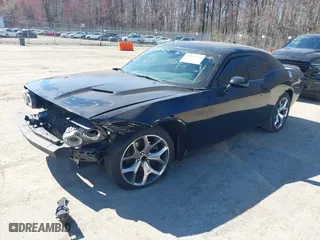 2016 Dodge Challenger SXT Plus with VIN 2C3CDZAG2GH301218, listed as a IAAI auction lot 41894825 with 124,209 mi miles. Bid and sale history available at carsss.com. Image 17.
