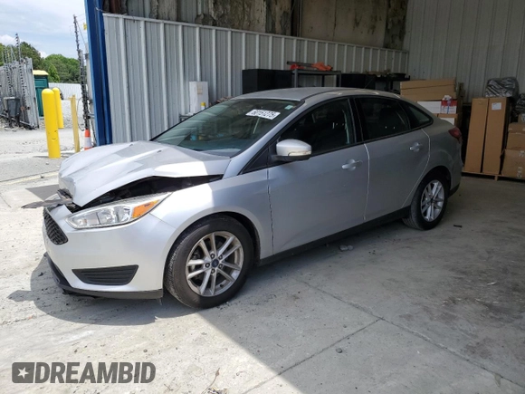 2017 Ford Focus SE with VIN 1FADP3F21HL258115, listed as a Copart auction lot 60151275 with 42,450 mi miles and Salvage title. Bid and sale history available at DreamBid. Image 1.