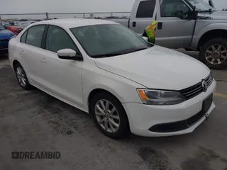 2013 Volkswagen Jetta SE with VIN 3VWDX7AJ1DM374789, listed as a IAAI auction lot 41957918 with 230,052 mi miles and . Bid and sale history available at DreamBid. Image 1.